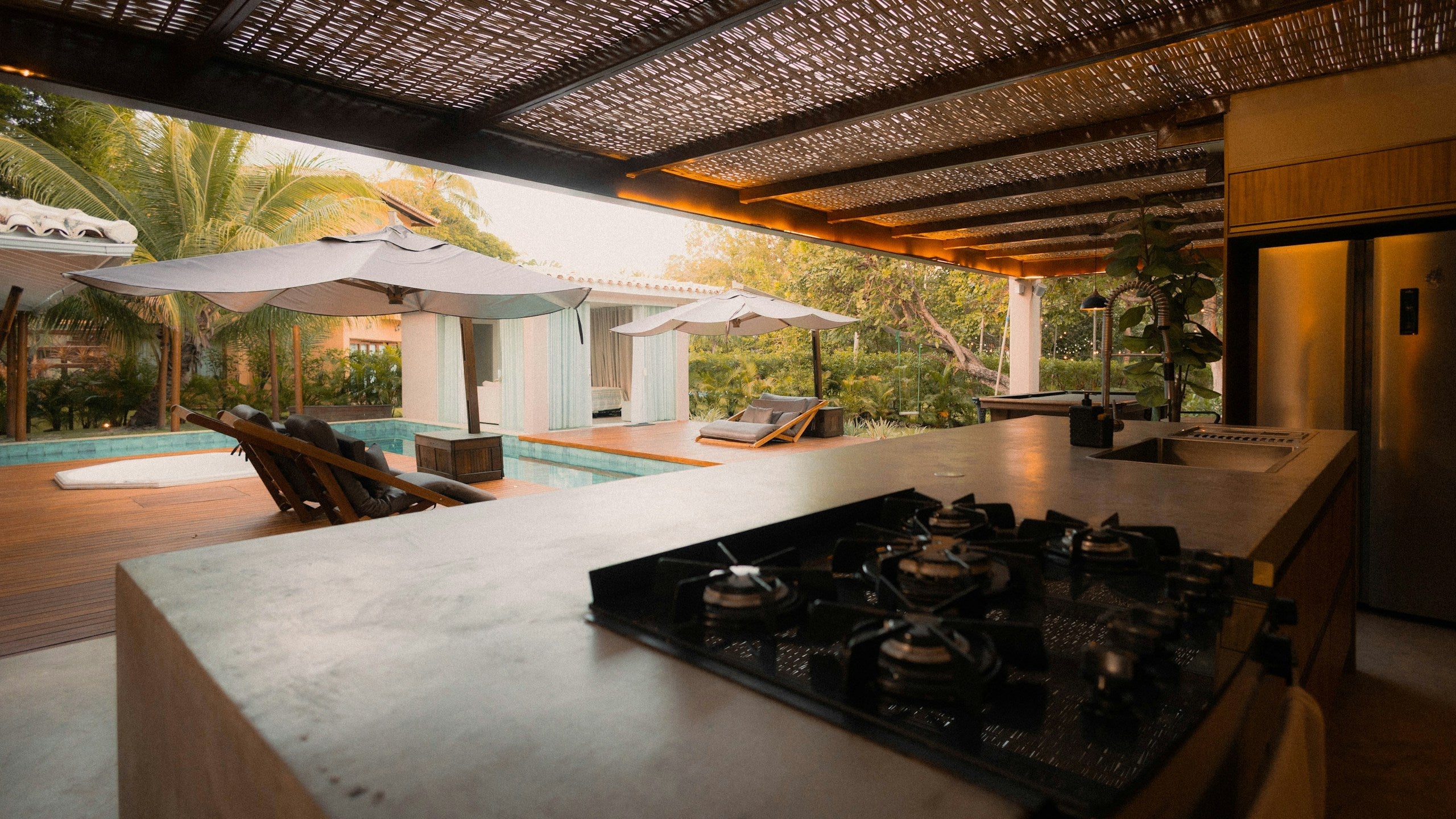 Premium outdoor kitchen with pool terrace luxury lifestyle