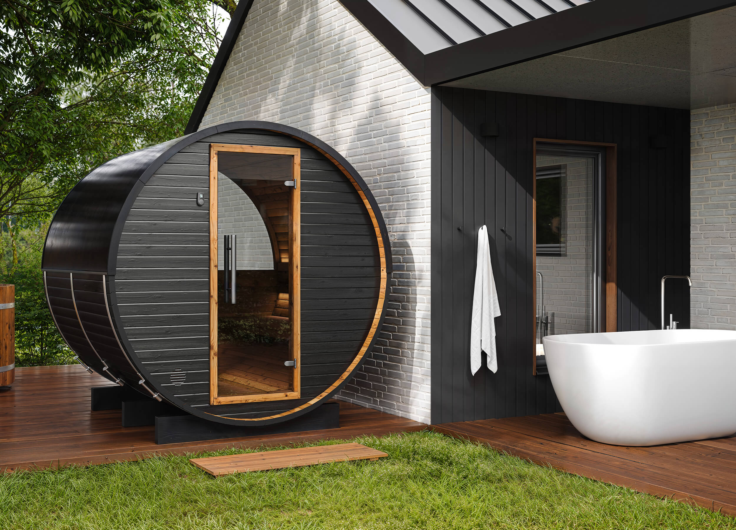 Auroom Halo barrel sauna in a garden setting