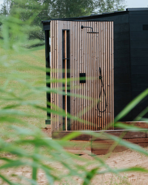 Auroom VelAqua outdoor shower full front panel natural vertical wood slats black fixtures