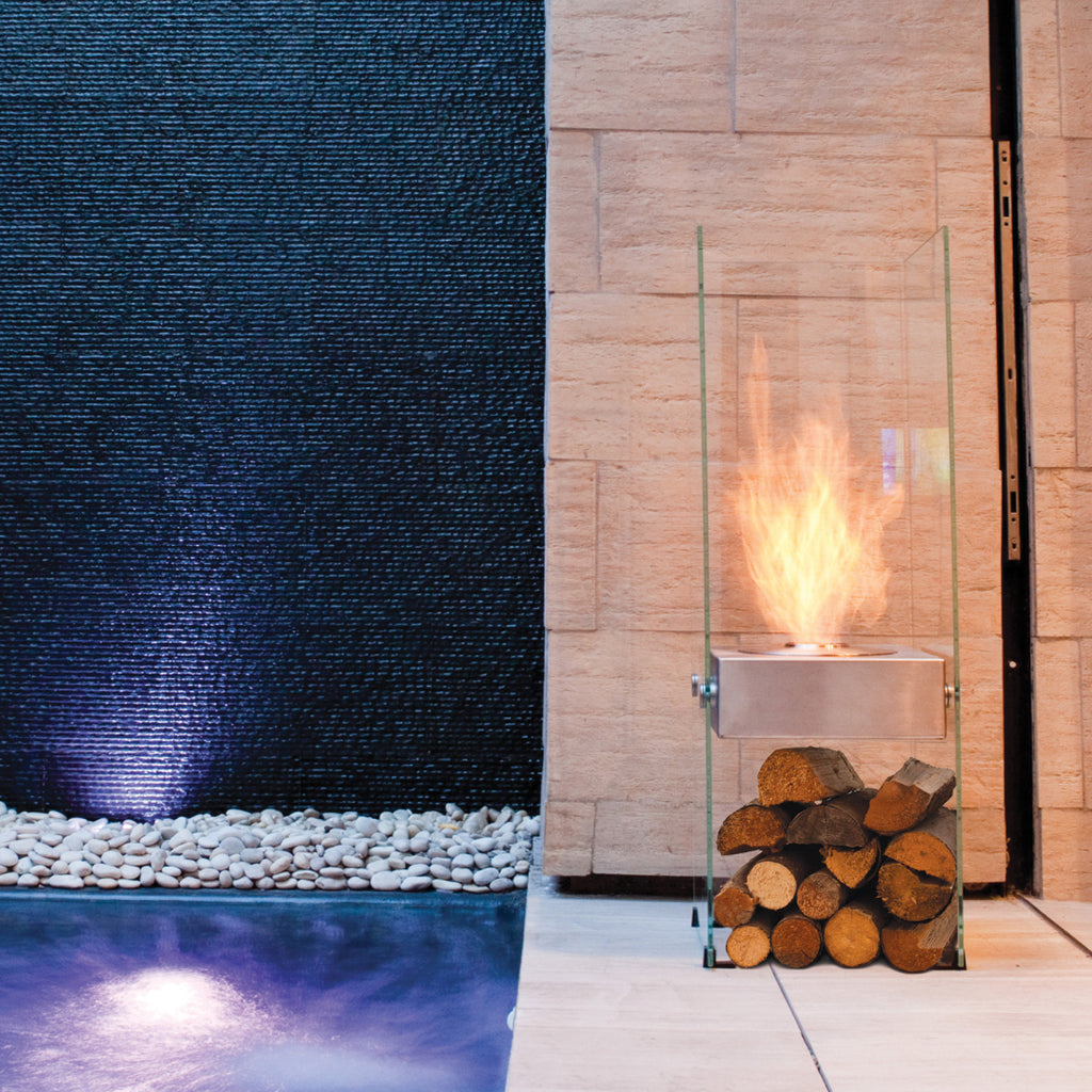 EcoSmart Fire Ghost glass bioethanol fireplace outdoors at night