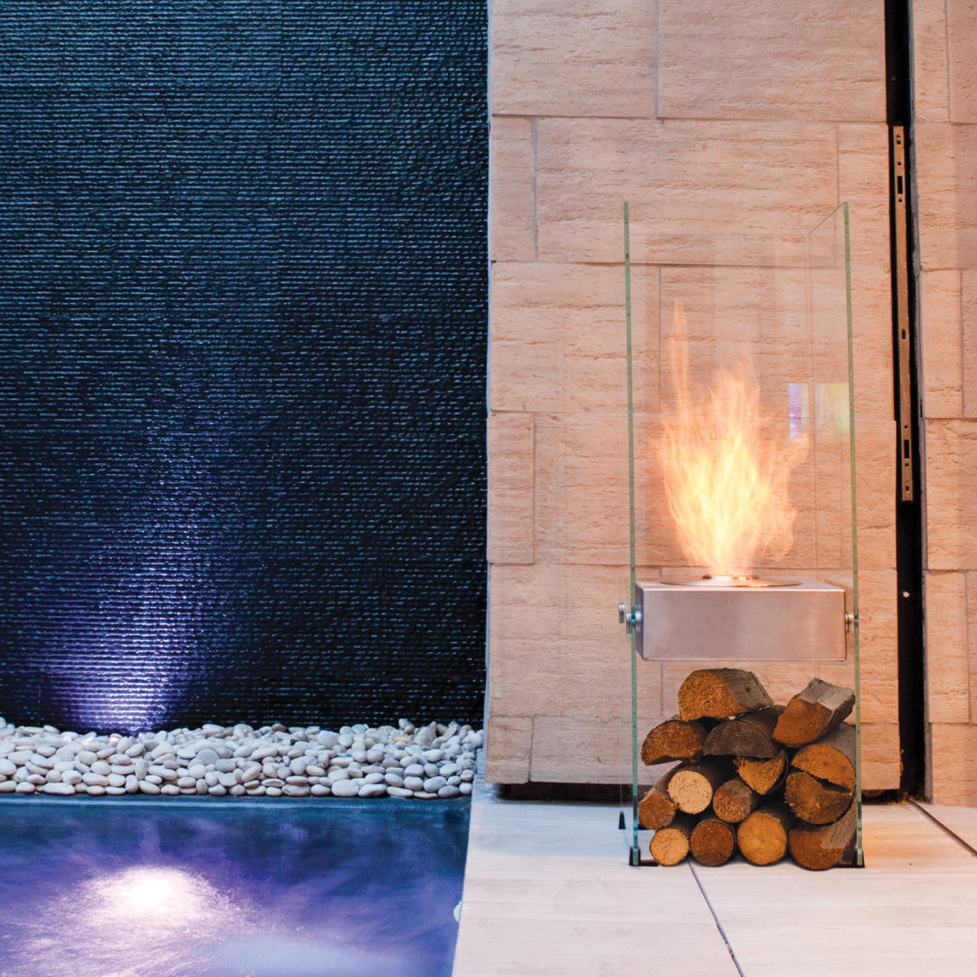 EcoSmart Fire Ghost glass bioethanol fireplace outdoors at night