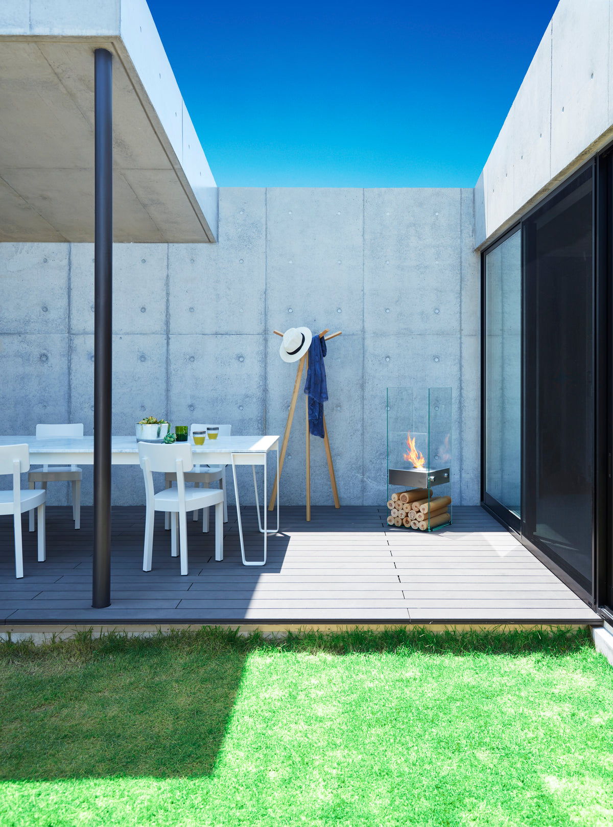 EcoSmart Fire Ghost bioethanol designer fireplace on private residence courtyard terrace