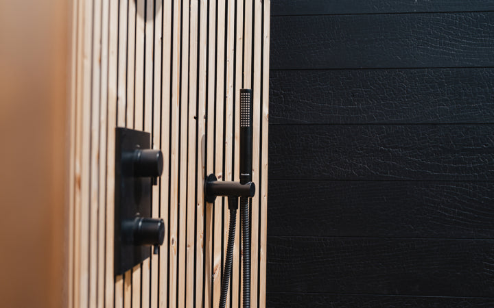 Auroom VelAqua outdoor shower side view wooden cladding outdoor terrace